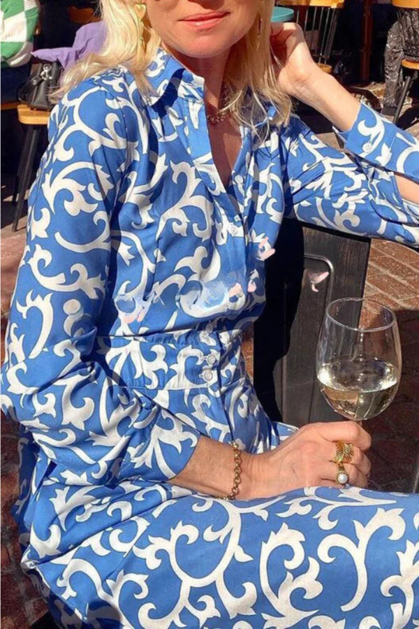 Deslumbra | Vestido camisero largo de manga larga con estampado, solapa, botones y bolsillo