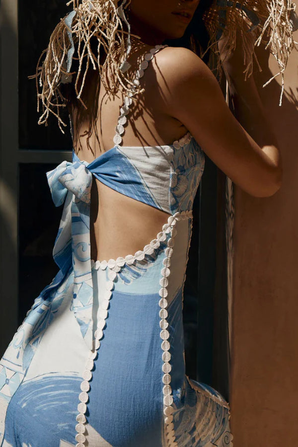 Deslumbra | Vestido largo acampanado con espalda estampada y lazo 