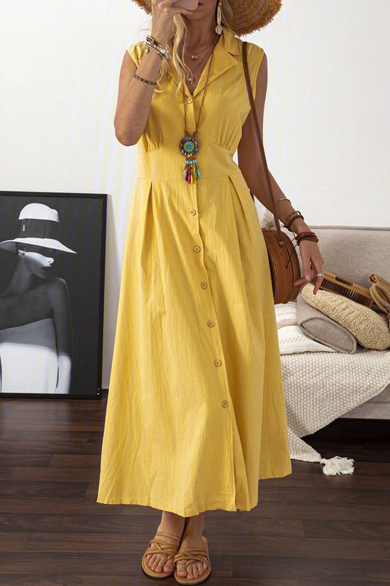 Deslumbra | Vestido midi sin mangas con botones en la solapa