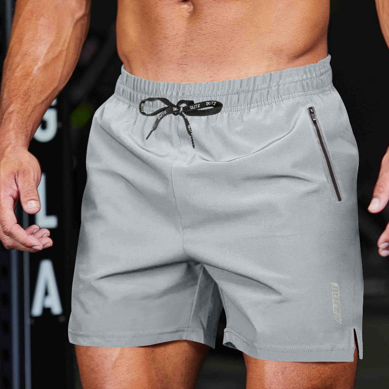 Brilla con luz propia | Shorts deportivos multifuncionales para hombre con tecnología de secado rápido y prácticas bolsas con cremallera