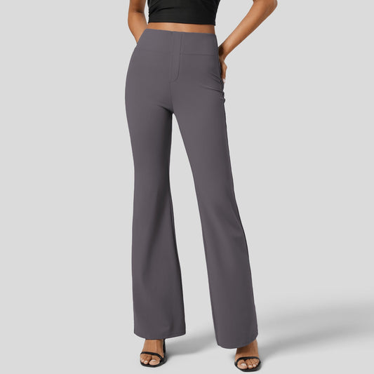 Gray pants worn by a person on a plain background