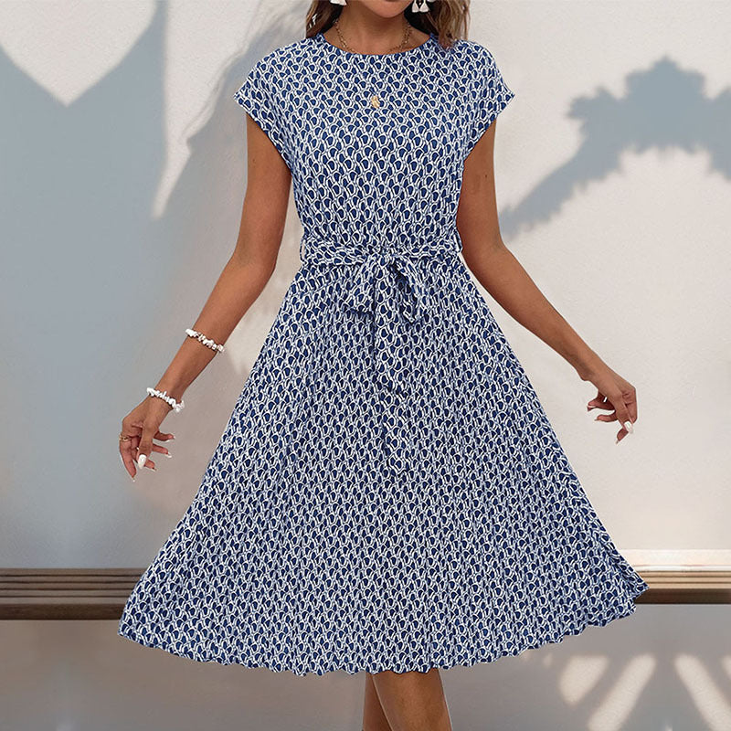 Deslumbra | Vestido plisado con estampado geométrico