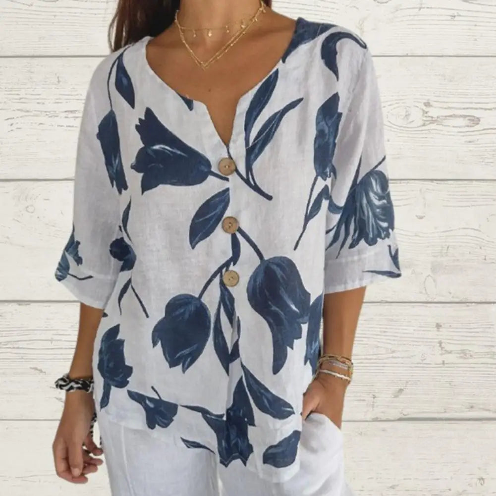 Brilla con luz propia | Blusa floral de cuello redondo para mujer