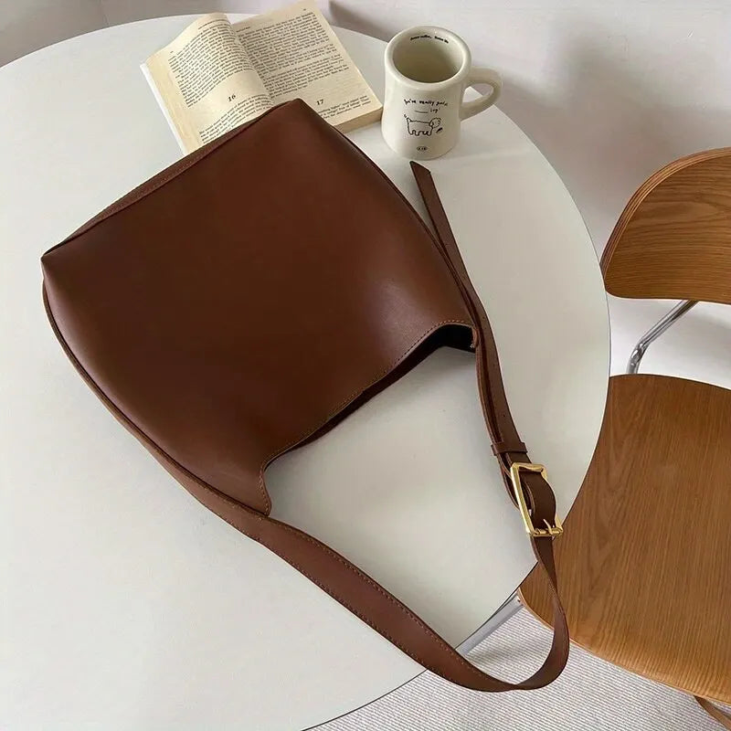 Out-Shine | Black leather bag