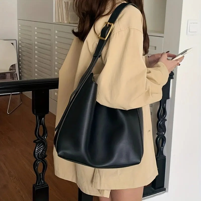 Out-Shine | Black leather bag