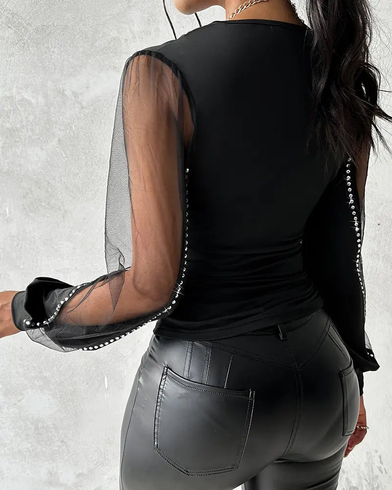 Deslumbra | Top fruncido con mangas abullonadas y escote pronunciado